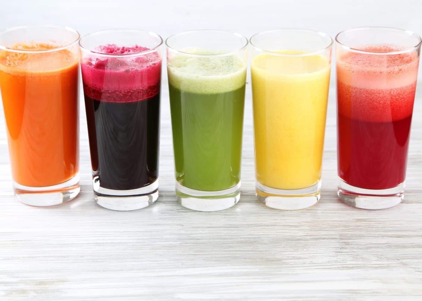https://www.cleaneatingkitchen.com/wp-content/uploads/2021/01/five-colorful-juices-lined-up.jpg