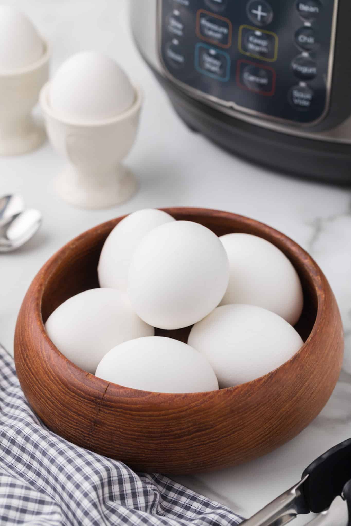 https://www.cleaneatingkitchen.com/wp-content/uploads/2022/01/two-minute-eggs-in-bowl-scaled.jpg