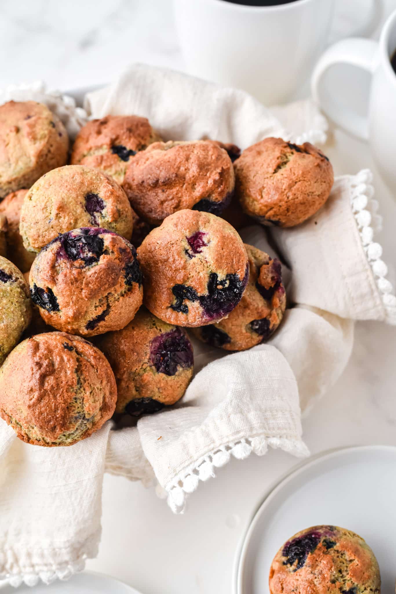 https://www.cleaneatingkitchen.com/wp-content/uploads/2022/03/air-fried-blueberry-muffins-hero-scaled.jpg