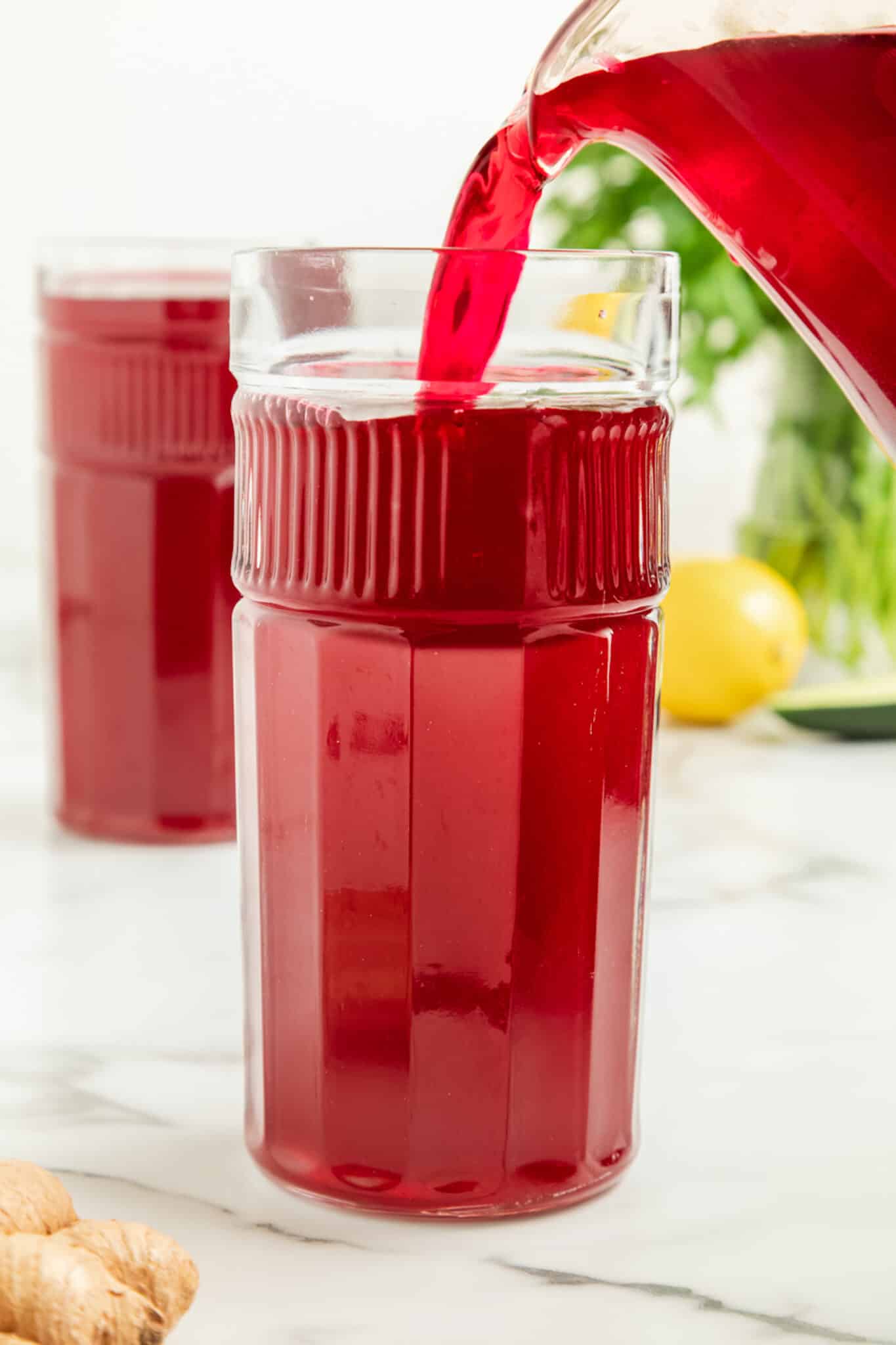 https://www.cleaneatingkitchen.com/wp-content/uploads/2022/08/pouring-beet-juice-scaled.jpg