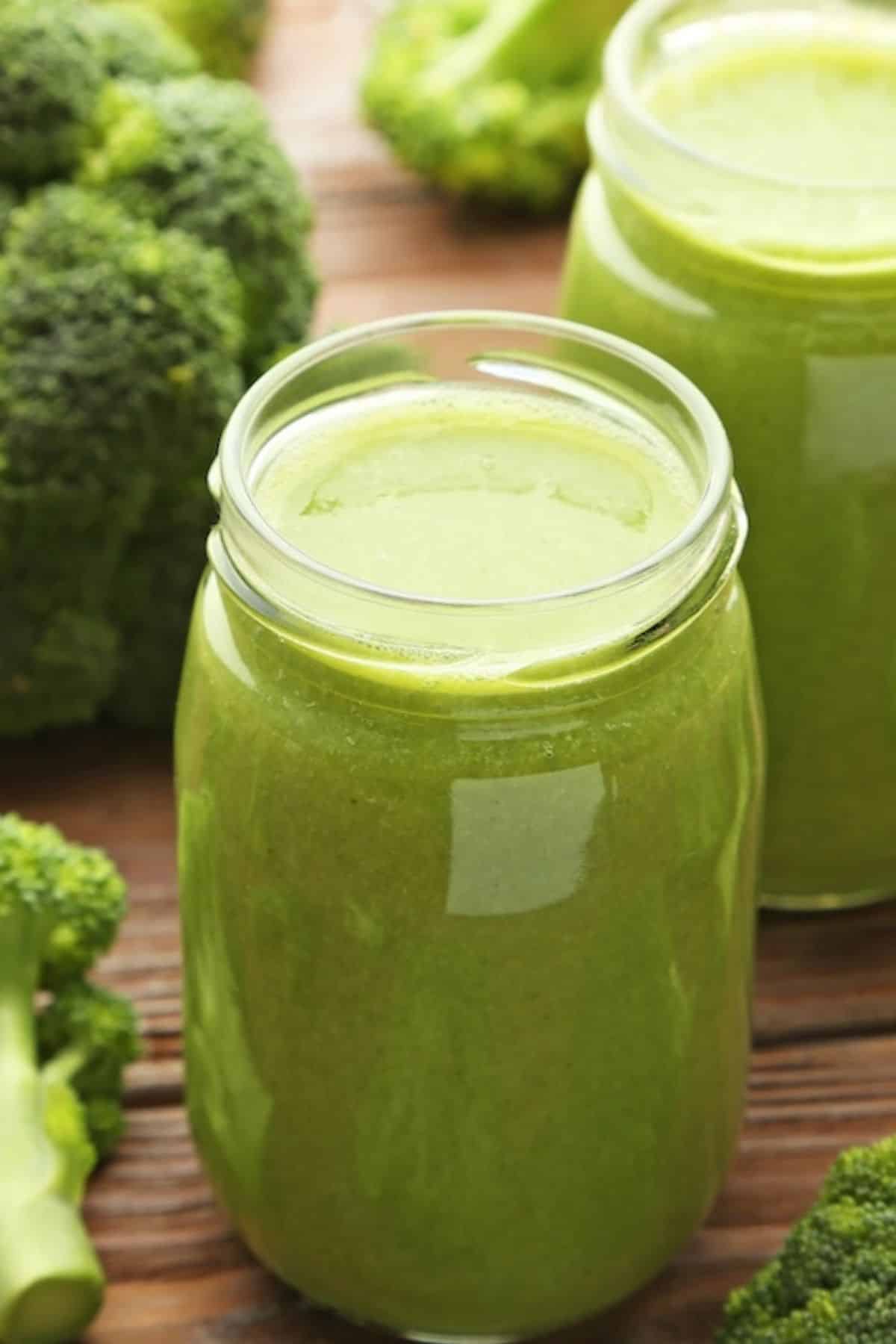a glass of fresh broccoli juice.
