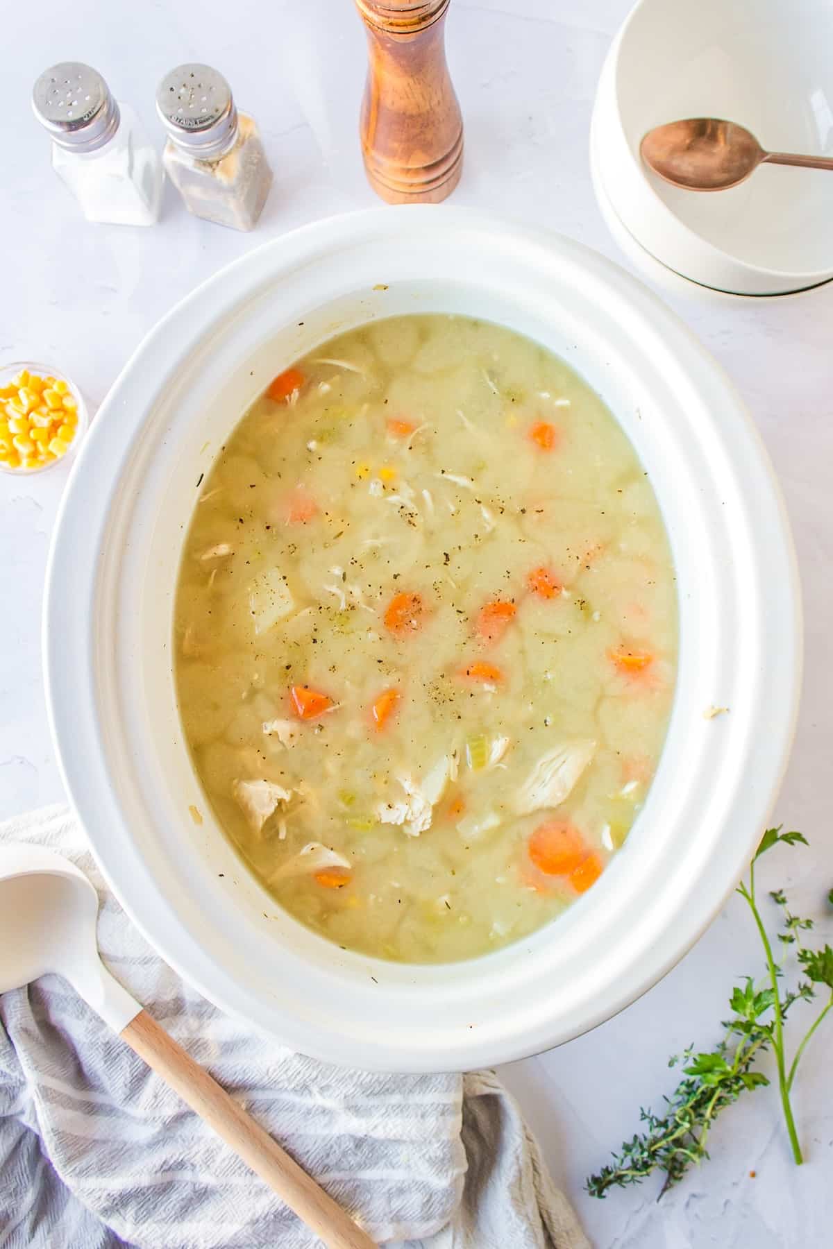 chicken, corn and potato soup in a crockpot.